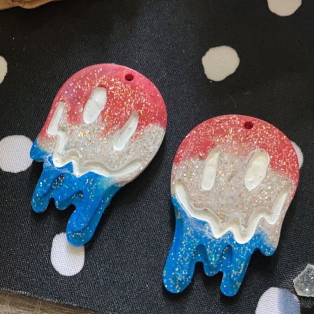 Red wjite and blue goopy face earrings